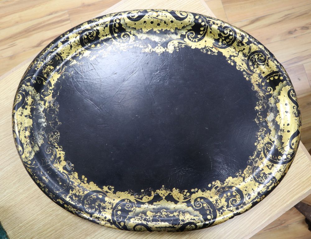 A Victorian oval papier mache tray, width 64cm